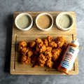 Buffalo Garlic Parm Cauliflower Bites - Blues Hog